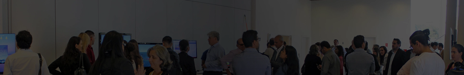 Imagem de fundo da seção Eventos, representando um congresso ou palestra.